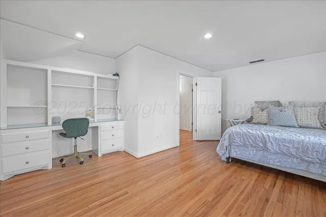 a bathroom with a sink a mirror and a toilet