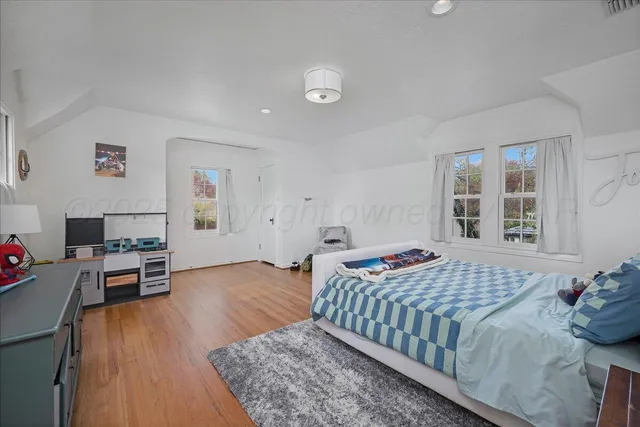 a view of a balcony with a potted plants