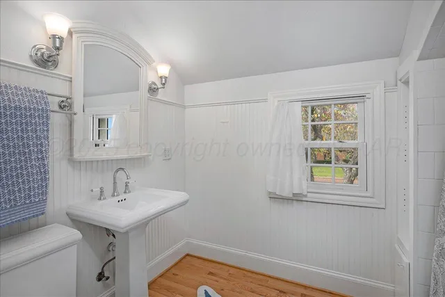 a swimming pool with outdoor seating