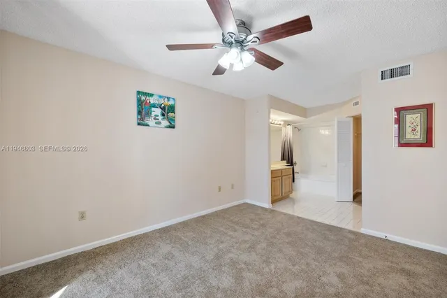 a bathroom with a double vanity sink mirror double and shower