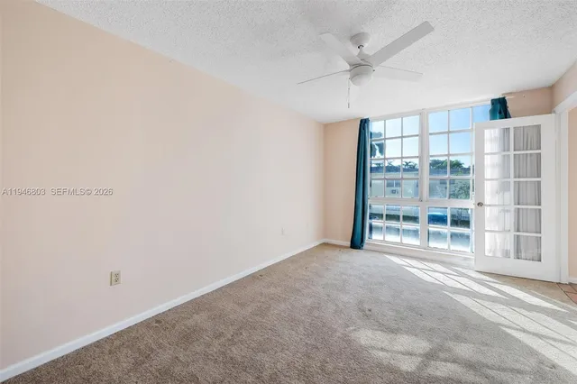 a bathroom with a sink double vanity and a shower