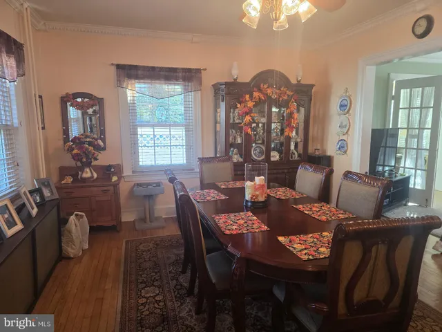 a kitchen with a stove a sink and a cabinets