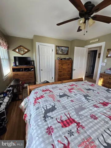 a bathroom with a sink vanity and mirror