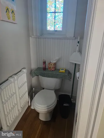 a view of a porch with wooden floor