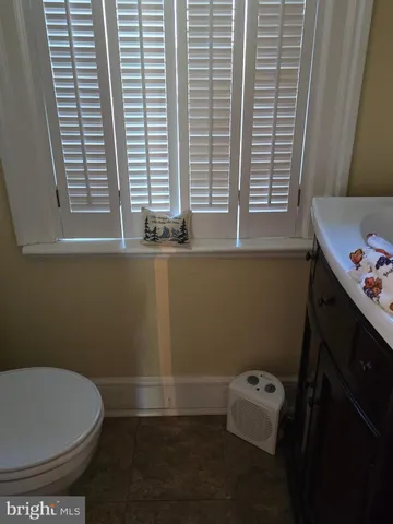 a room with furniture and a flat screen tv