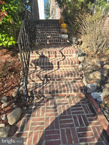 a living room with furniture and windows