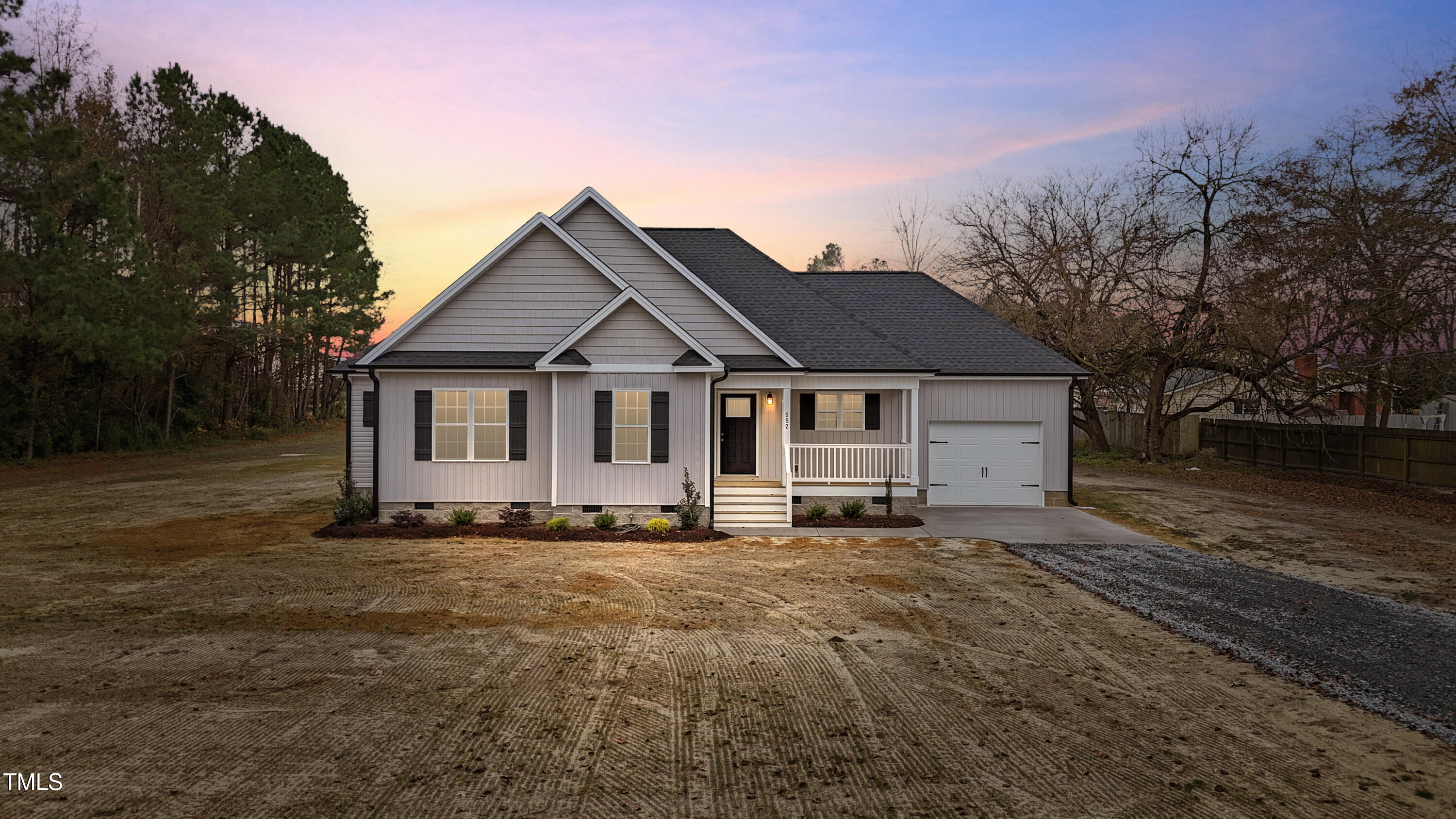 552 Rowan Road Clinton, NC 28328 - Photo 1 of 46 a front view of a house with a yard