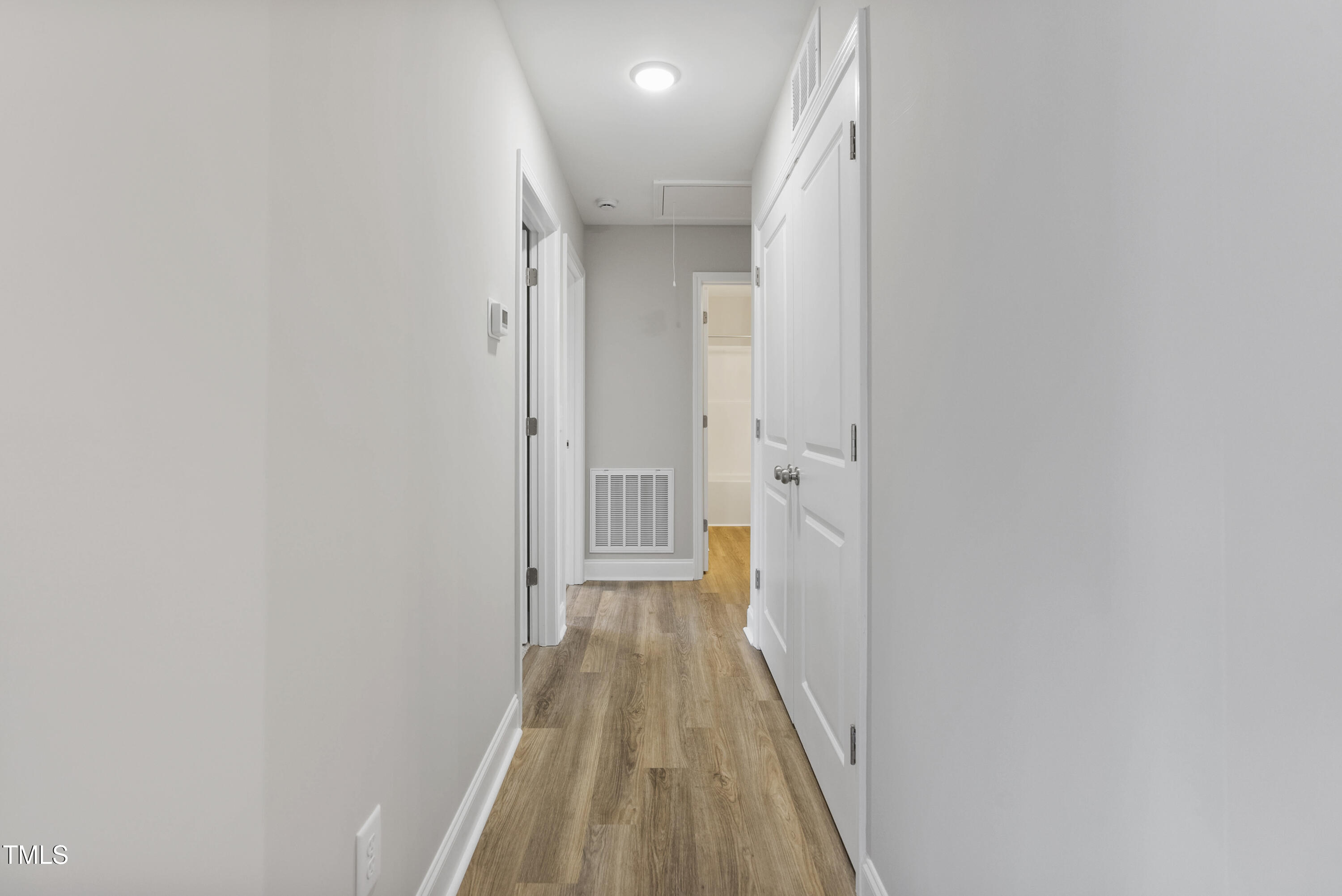 552 Rowan Road Clinton, NC 28328 - Photo 25 of 46 a view of a hallway with wooden floor