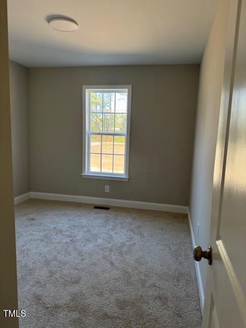 552 Rowan Road Clinton, NC 28328 - Photo 38 of 46 an empty room with a window