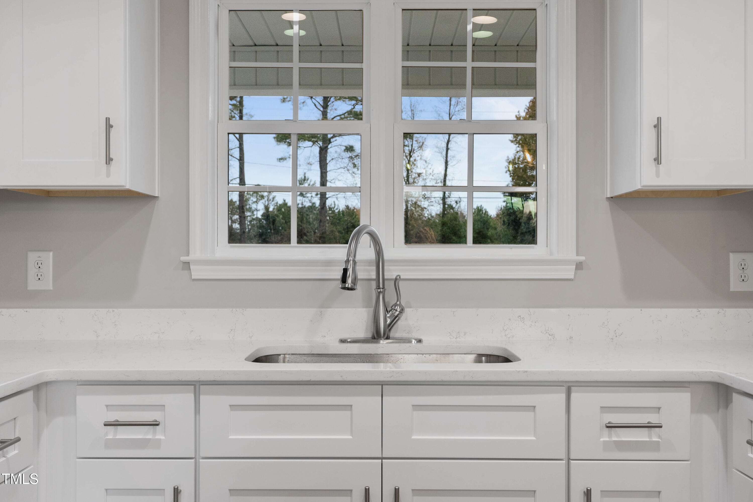 552 Rowan Road Clinton, NC 28328 - Photo 6 of 46 a kitchen with a sink and large window