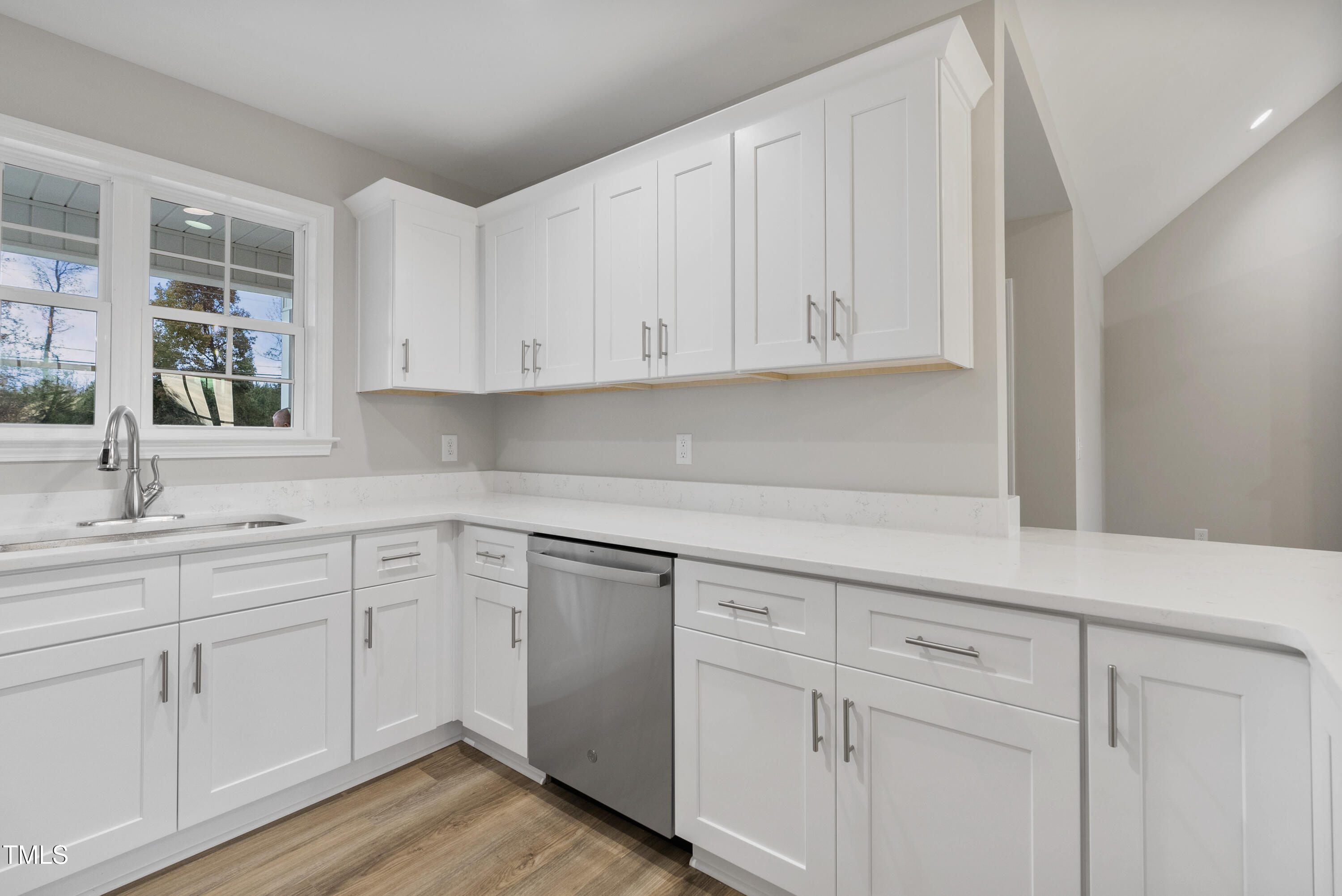 552 Rowan Road Clinton, NC 28328 - Photo 10 of 46 a kitchen with white cabinets and sink