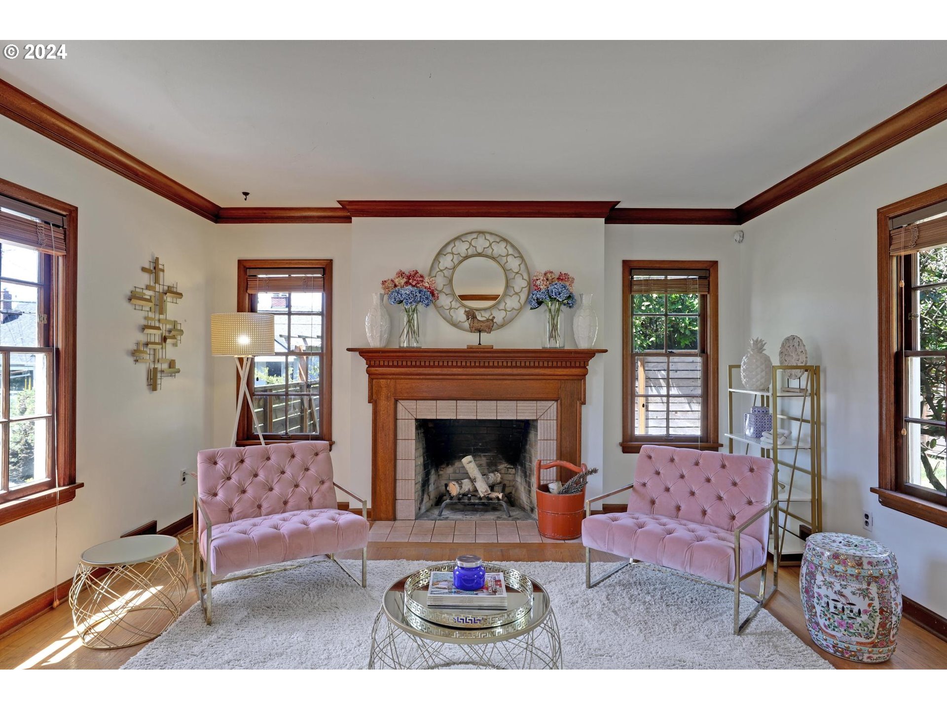6003 Southeast Stephens Street Portland, OR 97215 - Photo 11 of 46 a living room with furniture and a fireplace