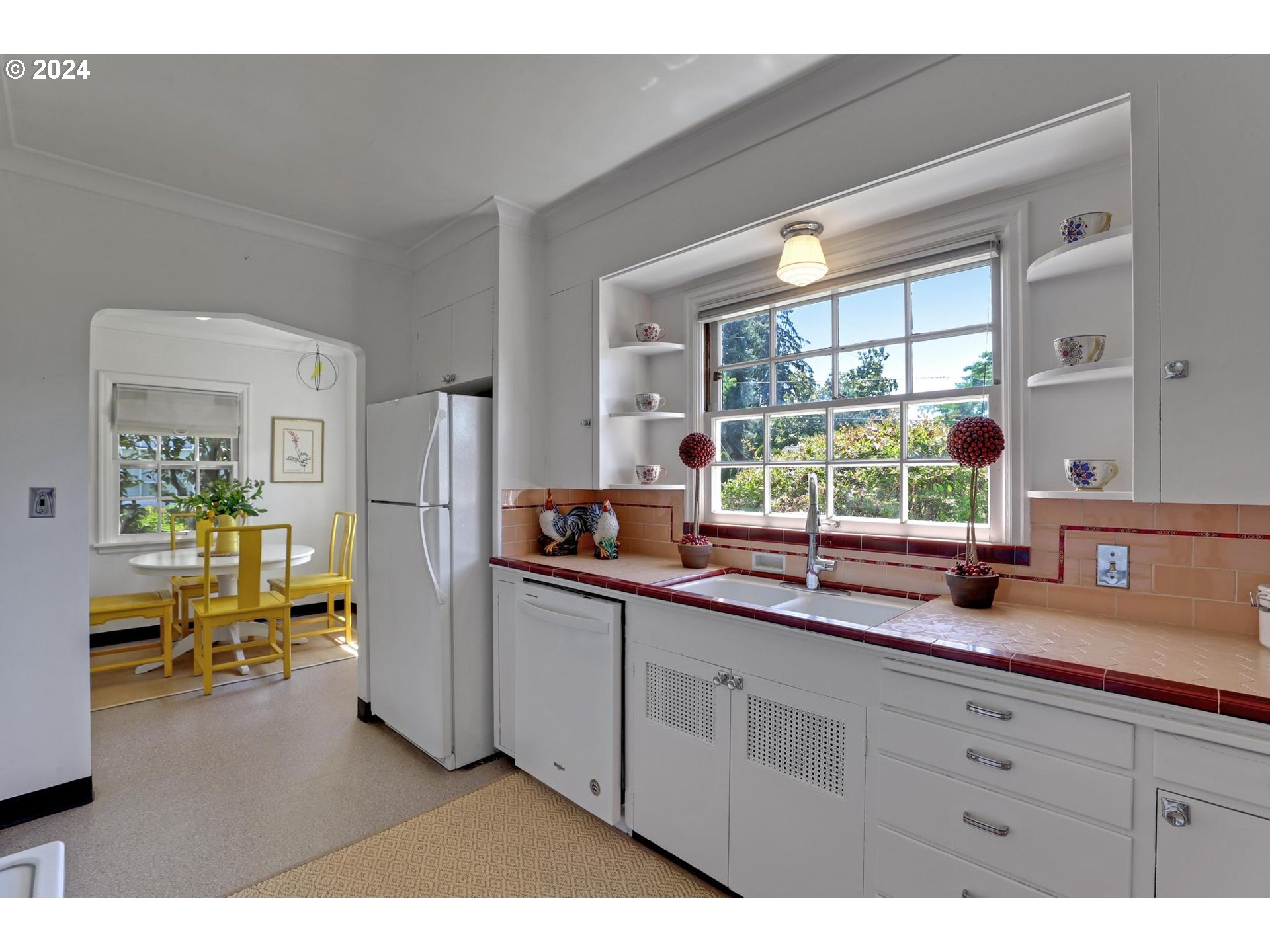6003 Southeast Stephens Street Portland, OR 97215 - Photo 17 of 46 a kitchen with sink and window