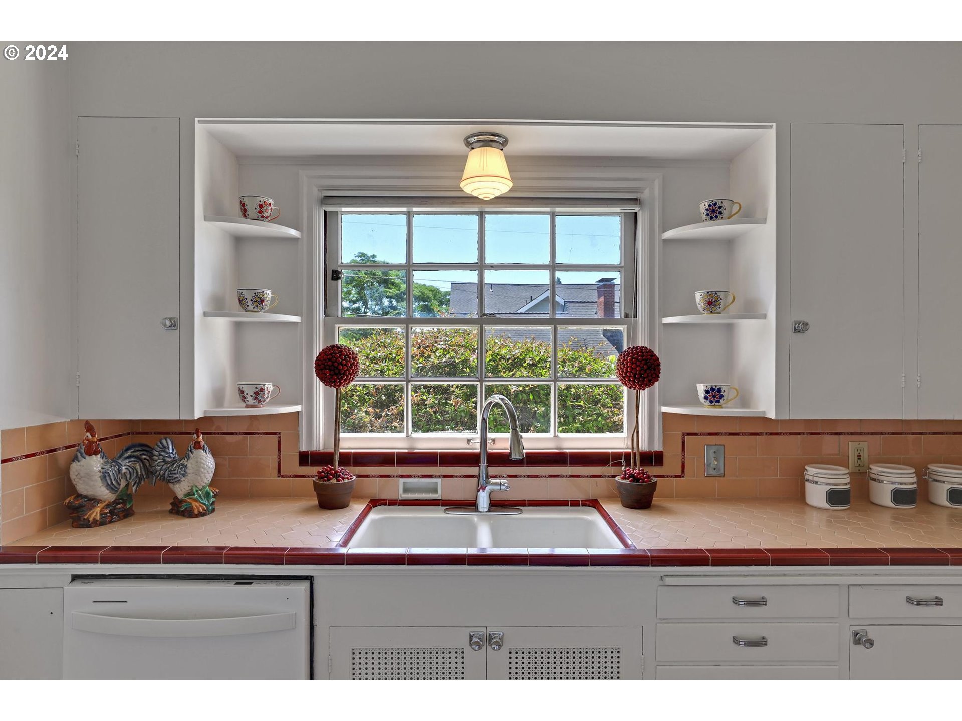 6003 Southeast Stephens Street Portland, OR 97215 - Photo 19 of 46 a sink sitting next to a window