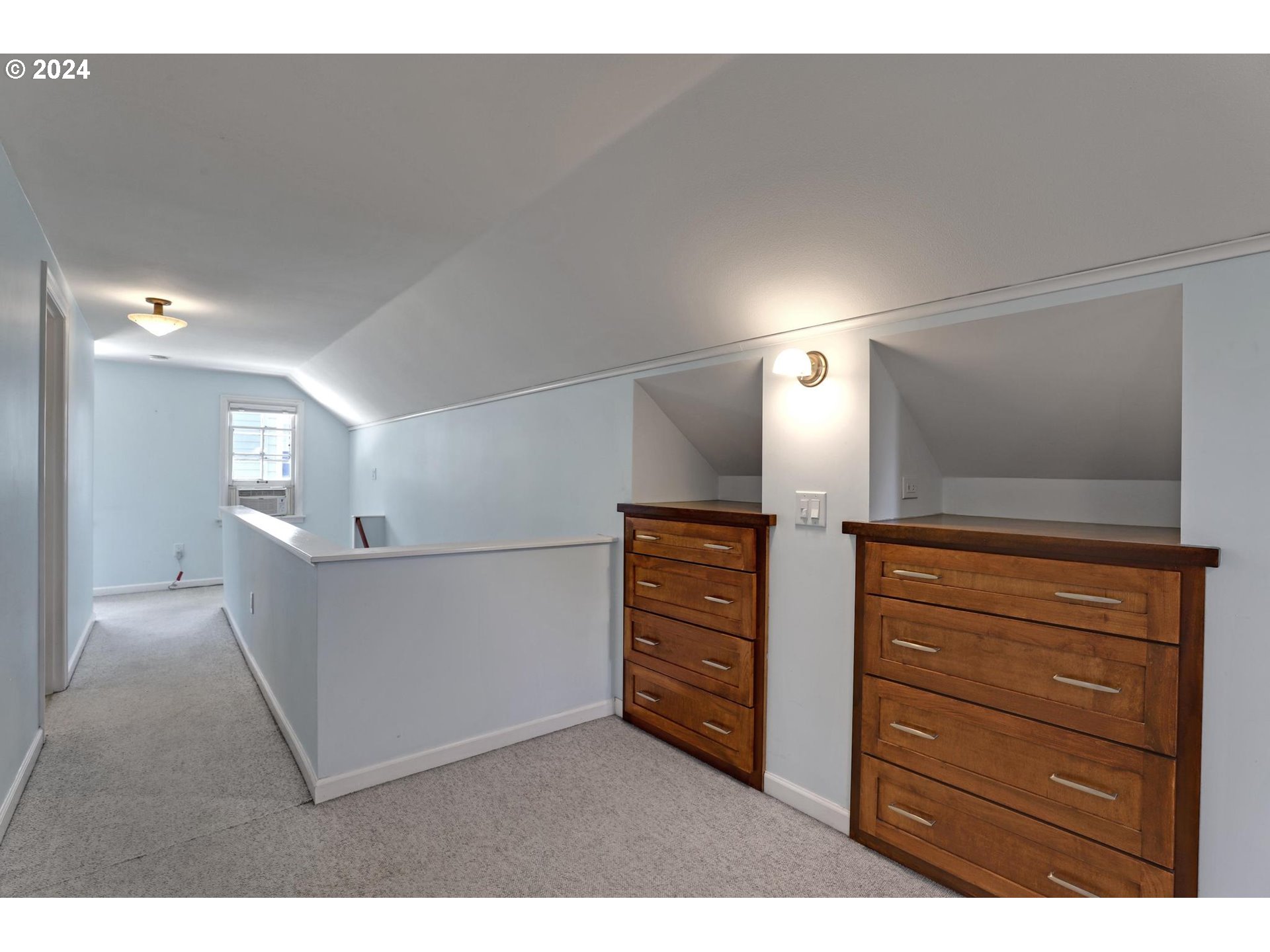 6003 Southeast Stephens Street Portland, OR 97215 - Photo 30 of 46 a view of room with cabinet and mirrors