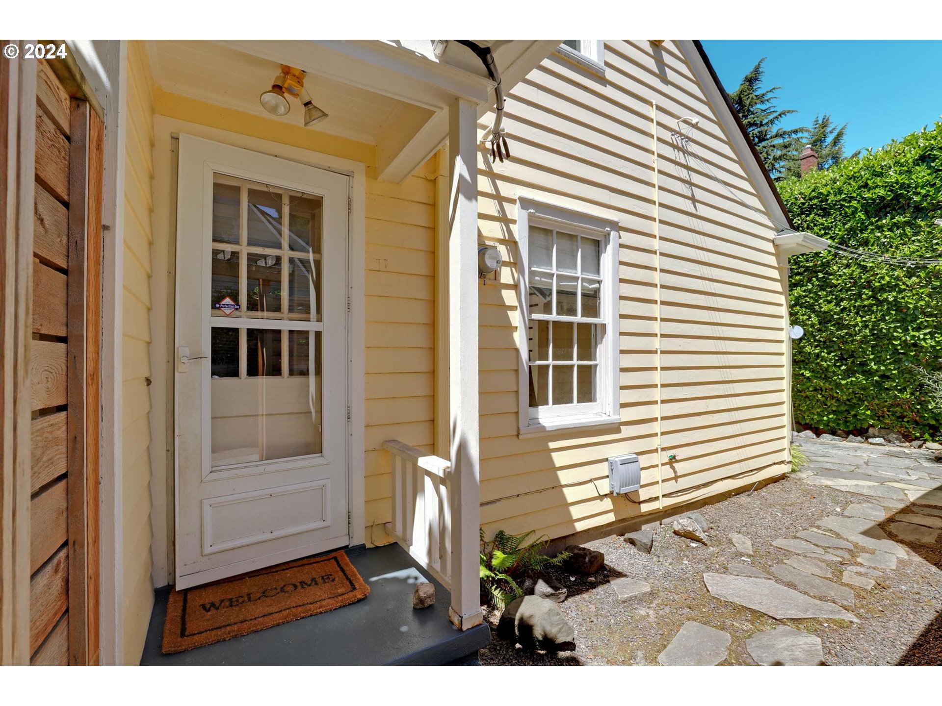 6003 Southeast Stephens Street Portland, OR 97215 - Photo 36 of 46 a view of front door of house