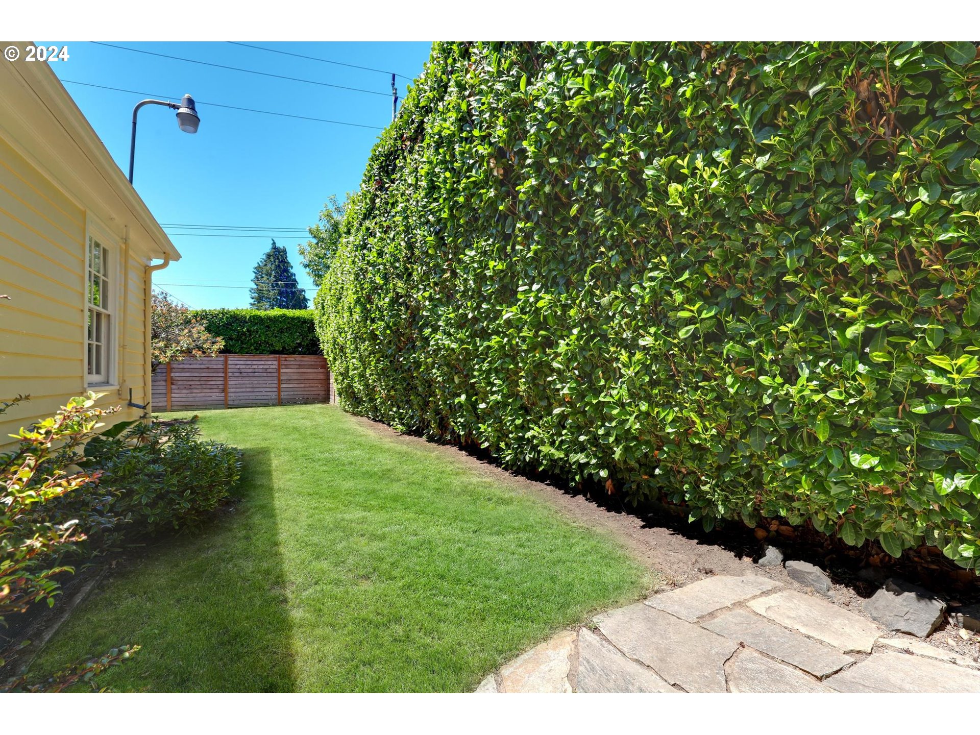 6003 Southeast Stephens Street Portland, OR 97215 - Photo 40 of 46 a view of yard with green space