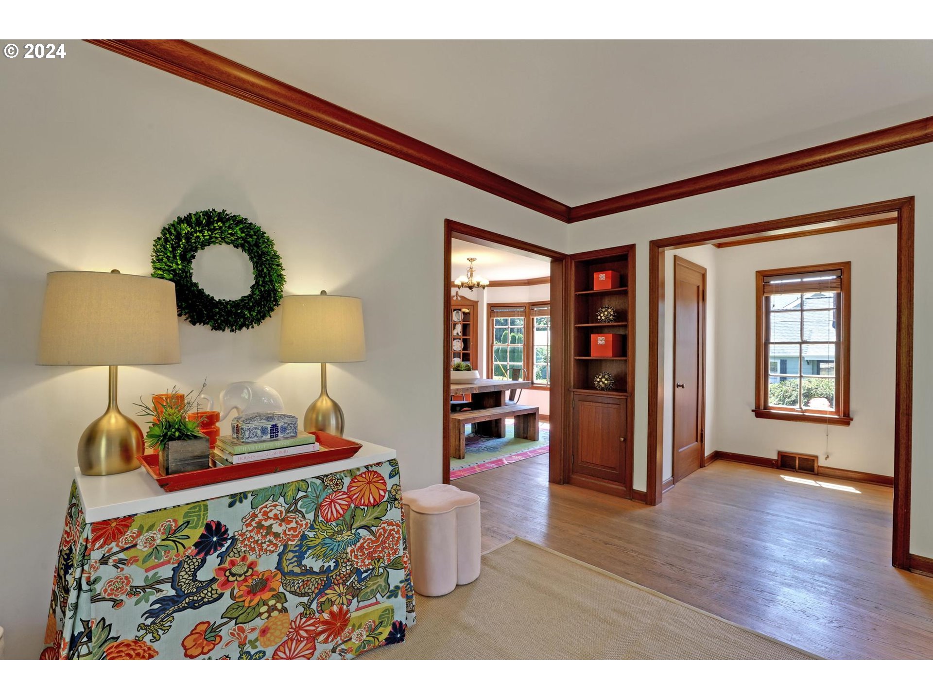 6003 Southeast Stephens Street Portland, OR 97215 - Photo 8 of 46 a very nice looking room with a large window and wooden floor