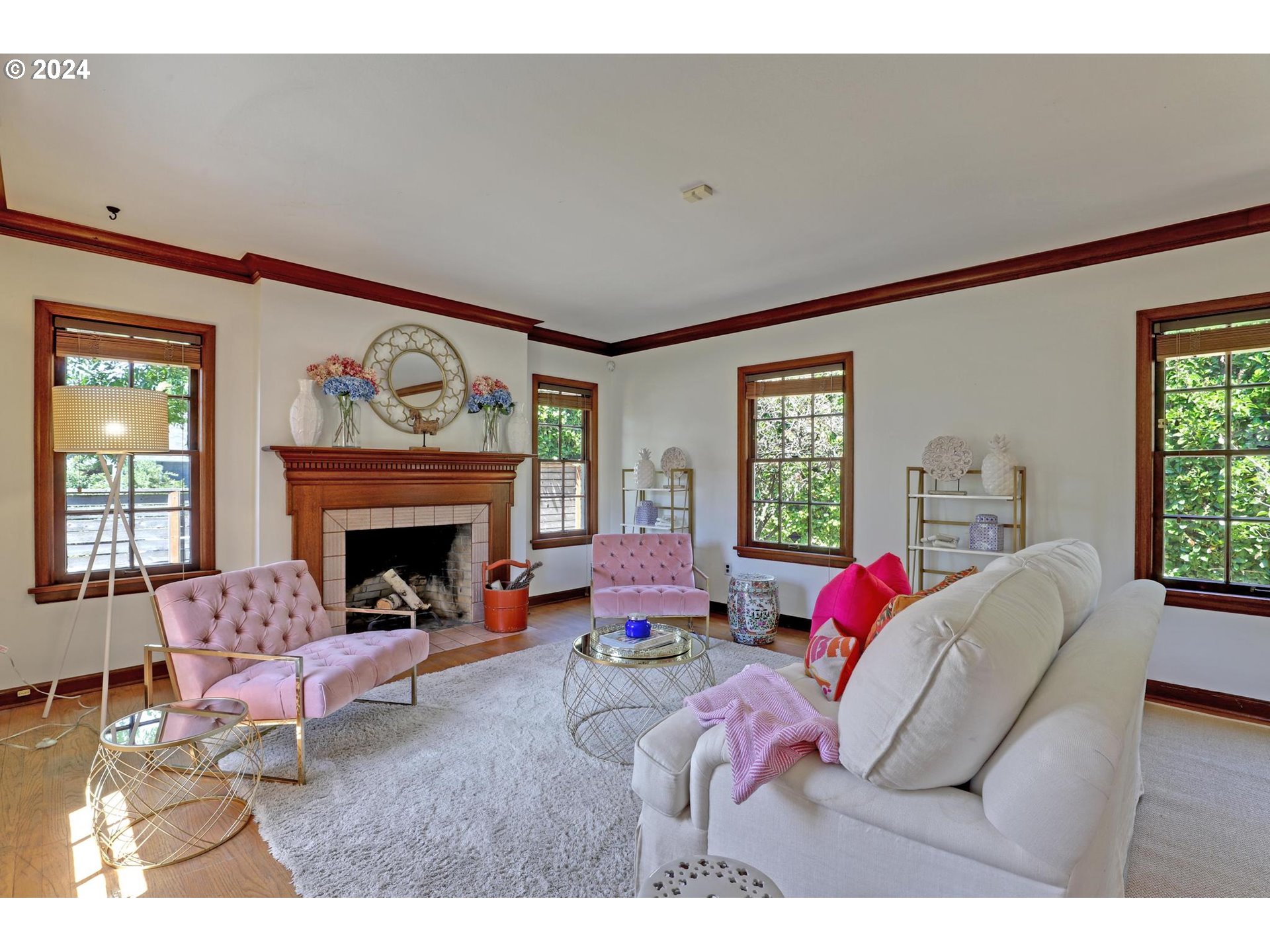 6003 Southeast Stephens Street Portland, OR 97215 - Photo 9 of 46 a living room with furniture and a fireplace