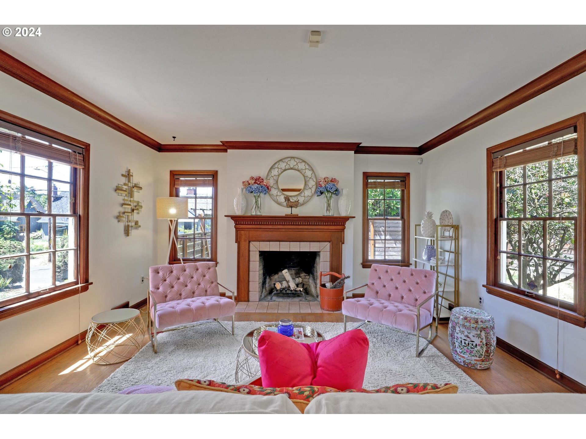 6003 Southeast Stephens Street Portland, OR 97215 - Photo 10 of 46 a living room with furniture and a fireplace