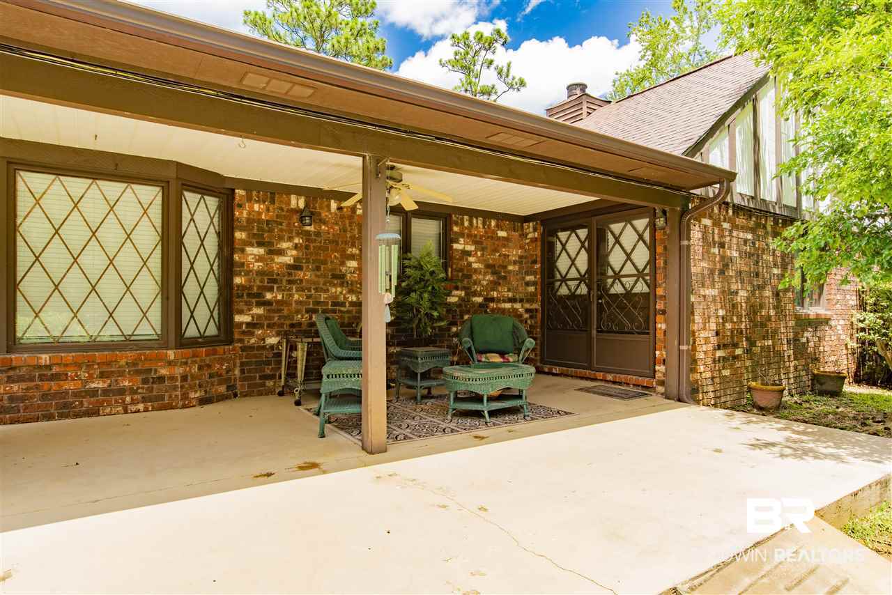 113 Fernway Drive Atmore, AL 36502 - Photo 23 of 25 Covered Back Porch
