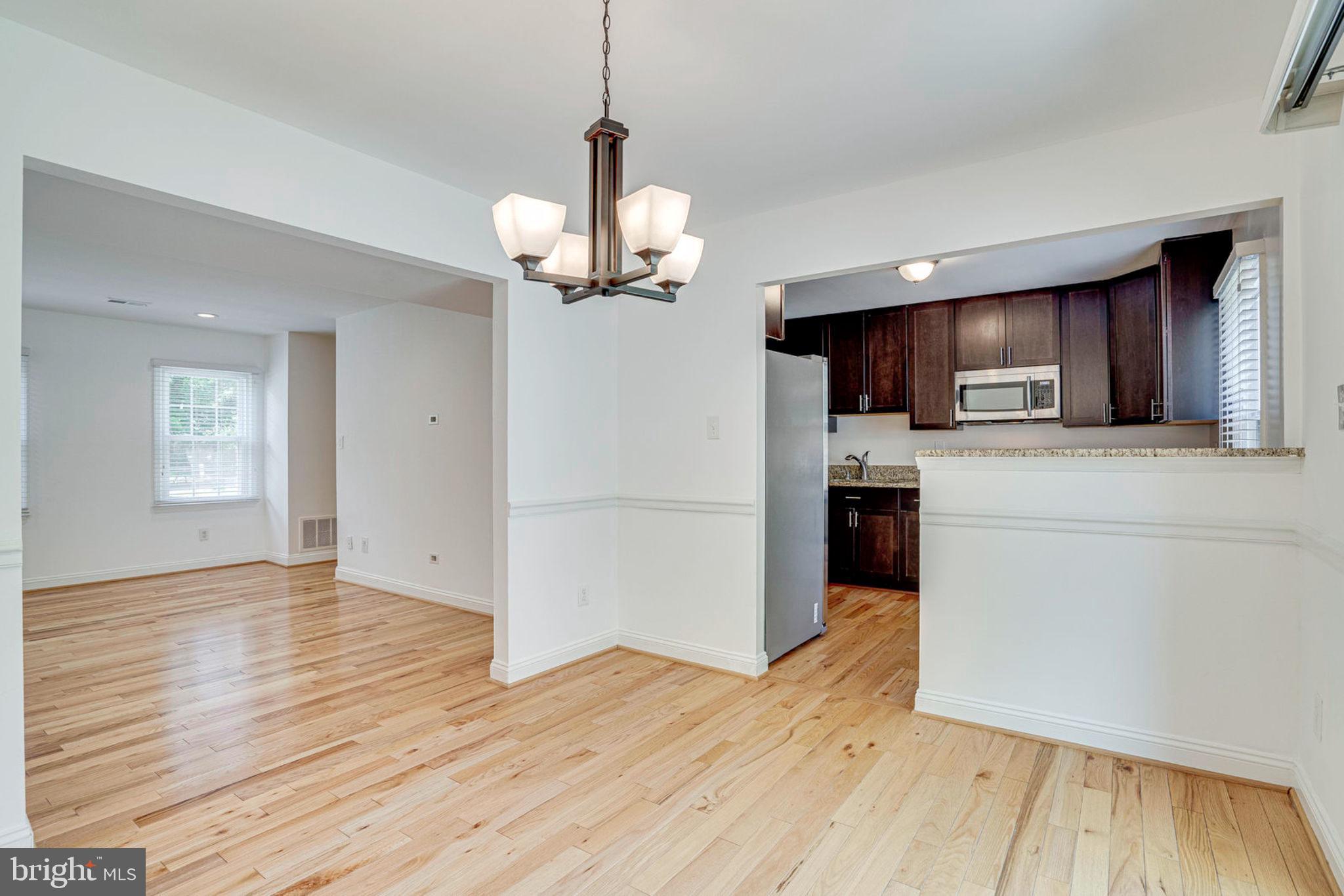 8453 Brainerd Court Springfield, VA 22153 - Photo 11 of 37 Dining Room view to living room & kitchen