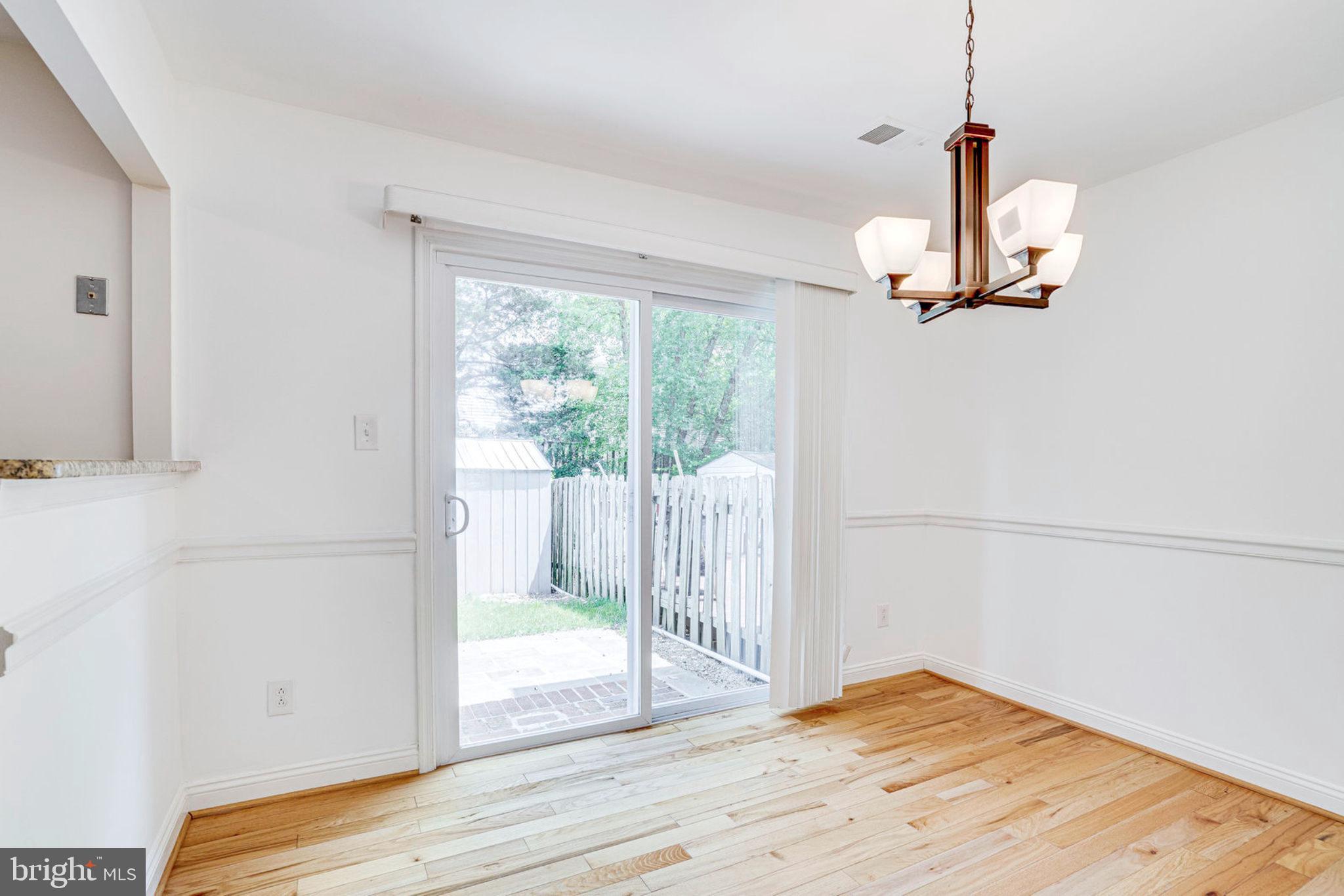 8453 Brainerd Court Springfield, VA 22153 - Photo 13 of 37 Dining Room with sliding doors to patio