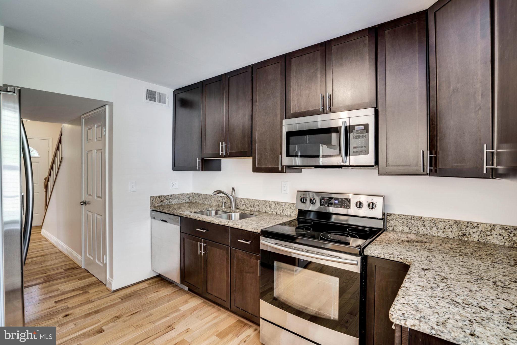 8453 Brainerd Court Springfield, VA 22153 - Photo 16 of 37 Updated Kitchen with granite counters