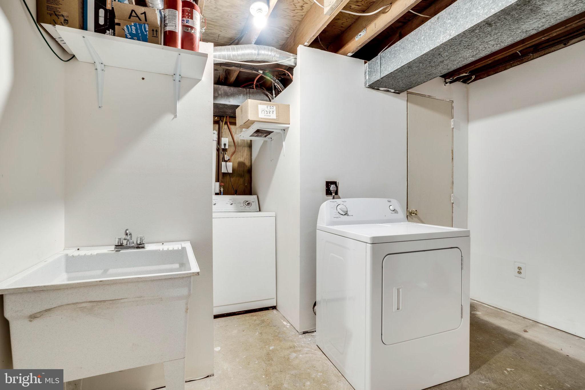 8453 Brainerd Court Springfield, VA 22153 - Photo 32 of 37 Large Laundry Room with plenty of storage