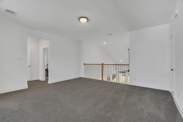 a view of a hallway with entryway