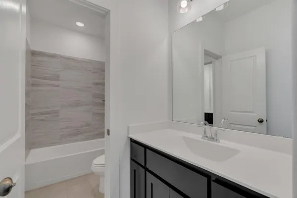 a close up of a bathtub curtain