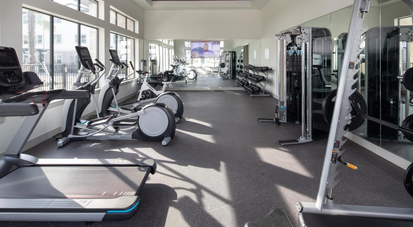 12111 South Main Street, Unit 13306 Houston, TX 77035 - Photo 17 of 24 a view of a room with gym equipment