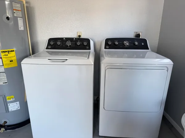 a utility room with dryer and washer