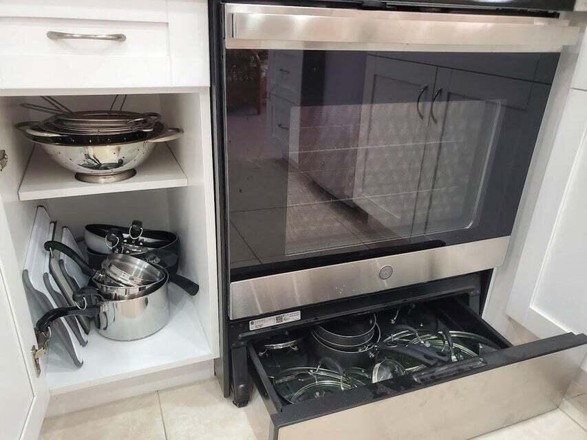1605 Highway 1, Unit F203 Jupiter, FL 33477 - Photo 20 of 39 a close view of shoes and a stove