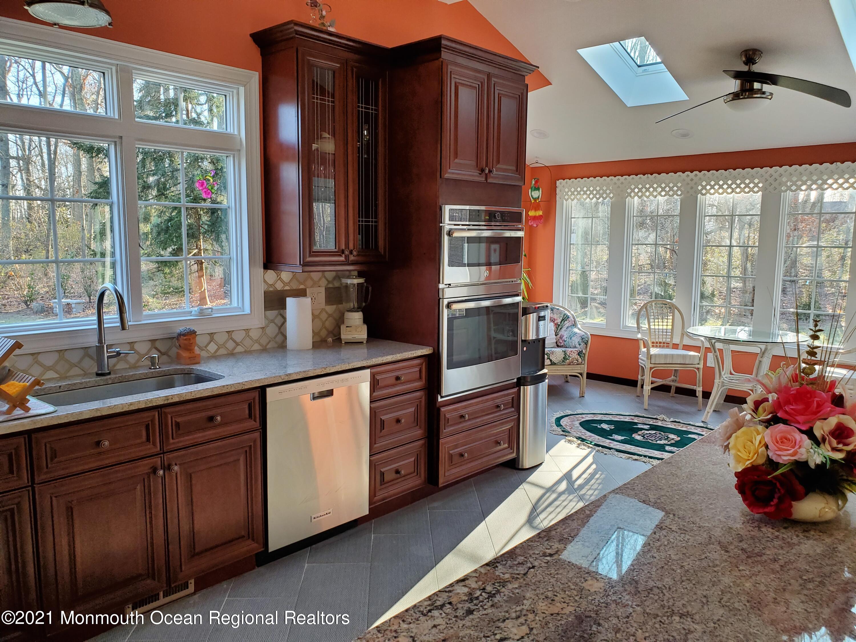 626 West Farms Road Howell, NJ 07731 - Photo 14 of 26 Kitchen with Sun Room