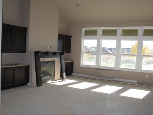 8850 Coolidge Road, Unit 2 Yakima, WA 98903 - Photo 4 of 15 a living room with a fireplace and a window