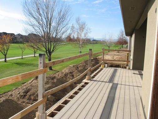 8850 Coolidge Road, Unit 2 Yakima, WA 98903 - Photo 9 of 15 a view of a balcony with wooden floor and fence