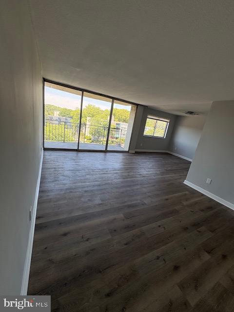 1836 Metzerott Road, Unit 704 Hyattsville, MD 20783 - Photo 21 of 33 wooden floor in an empty room with a window