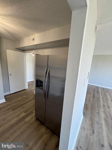 1836 Metzerott Road, Unit 704 Hyattsville, MD 20783 - Photo 28 of 33 a view of a hallway with wooden floor