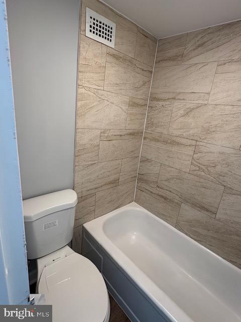 1836 Metzerott Road, Unit 704 Hyattsville, MD 20783 - Photo 8 of 33 a bathroom with a toilet and a shower