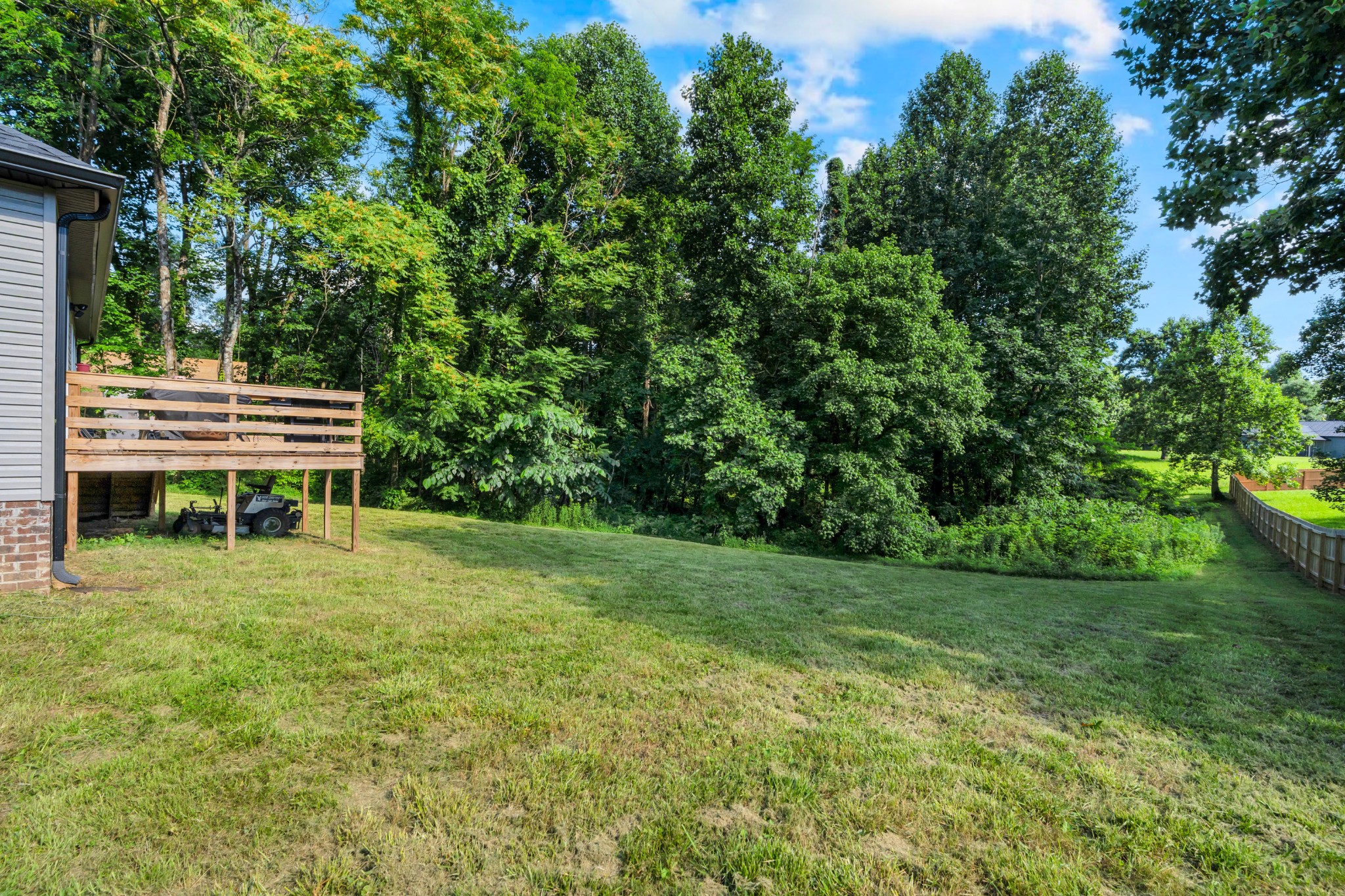 1147 Mt Herman Road Fayetteville, TN 37334 - Photo 23 of 31 a view of backyard with table and chairs and potted plants