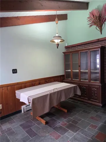 a spacious bathroom with a large tub and shower