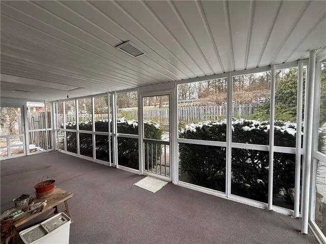 a view of a room with rack on the wall