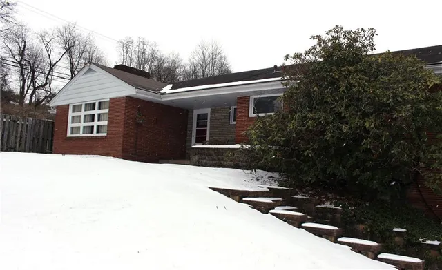 a house view with a outdoor space