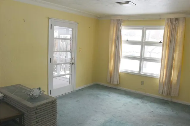 an empty room with windows