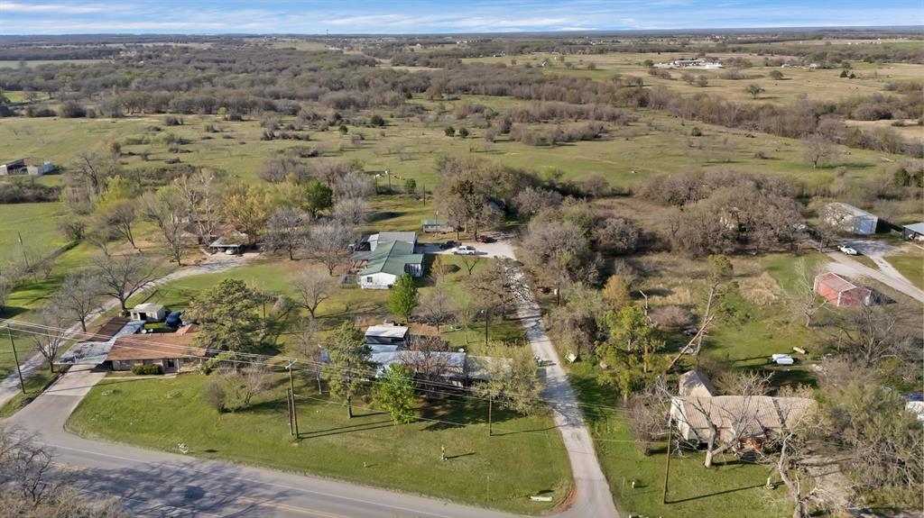 202 Johns Road Chico, TX 76431 - Photo 8 of 33 an aerial view of residential houses with outdoor space