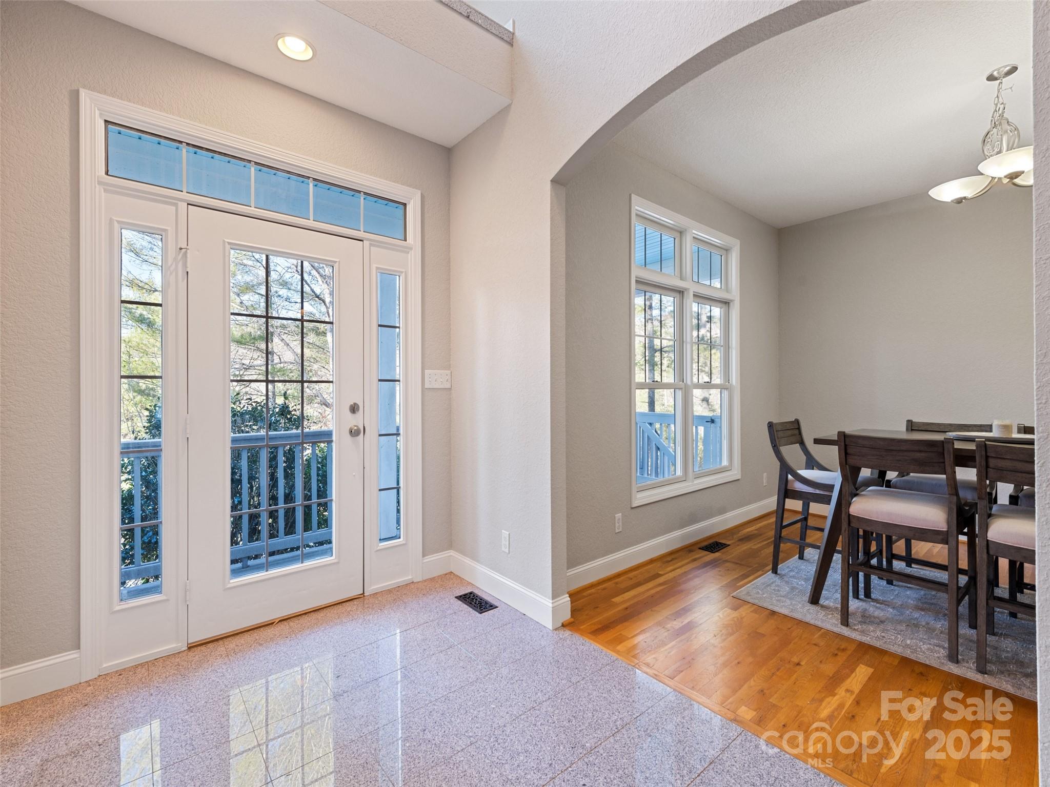 15 Lone Coyote Ridge Fletcher, NC 28732 - Photo 16 of 46 a dining room with furniture and wooden floor