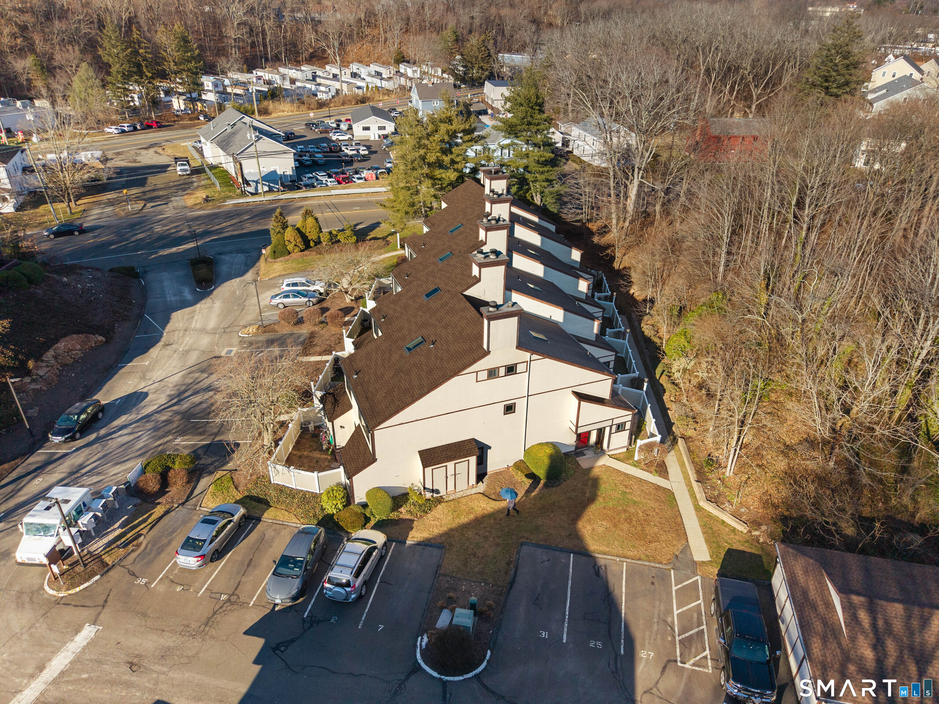 81 Main Street, Unit 31A Branford, CT 06405 - Photo 2 of 40 End unit by the woods and steps to the garage
