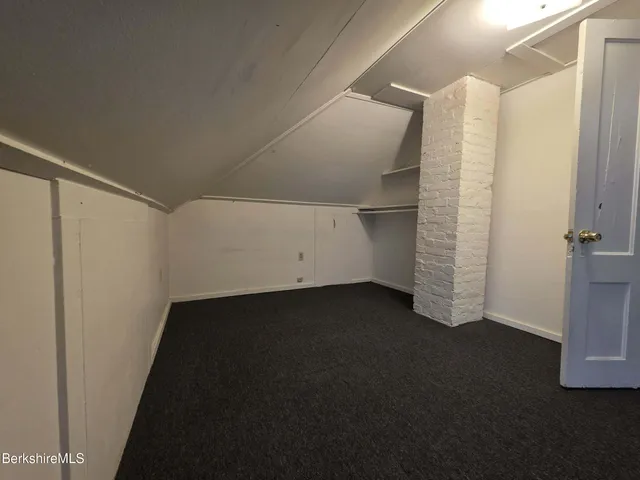 a view of a storage & utility room with closet