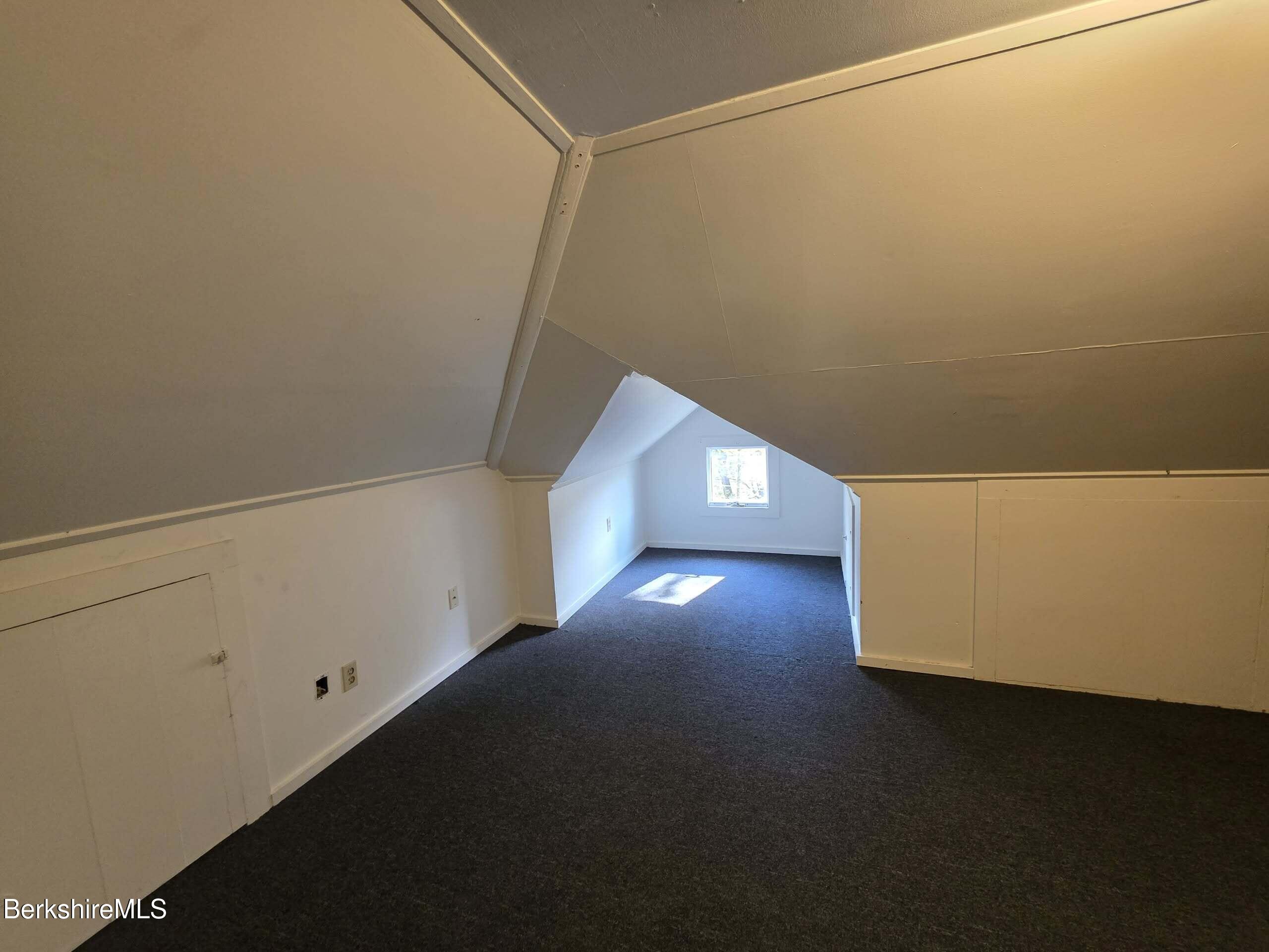 57 Beacon Street, Unit 3 North Adams, MA 01247 - Photo 8 of 10 a view of an empty room with a window